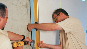 installing a basement wall finishing system in Amsterdam
