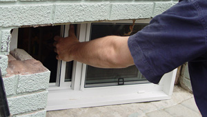 Installing new windows in a Clifton Park finished basement