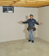 Ballston Spa basement insulation covered by EverLast wall paneling, with SilverGlo insulation underneath