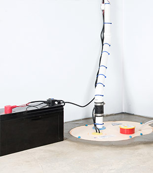 A sump pump installed in Cohoes by Adirondack Basement Systems