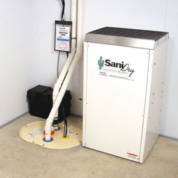 Sump pump system, dehumidifier, and basement wall panels installed during a sump pump installation in Watervliet