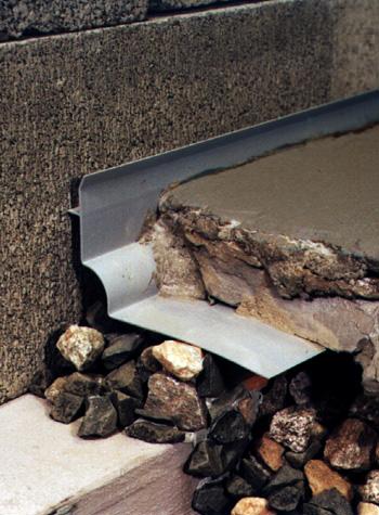basement weeping tile system installed on an extremely thin concrete slab floor