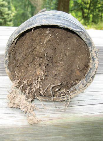 photo of a weeping tile system for waterproofing wet basements.
