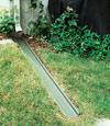 A recessed gutter drain extension installed in Castleton On Hudson, New York