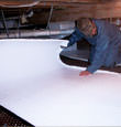 Clifton Park insulation being installed in a crawl space.