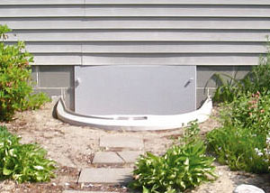 Rigid plastic crawl space access well installed in a Troy crawl space
