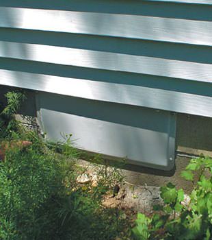 A gray crawl space vent cover in Ballston Lake