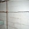 Severe foundation damage from a long crack in a bucking wall of a Gansevoort home.