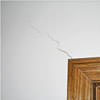 wall cracks along a doorway in a Gansevoort home.