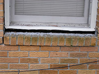 A window sill cracking and separating from the foundation wall in a Averill Park home.