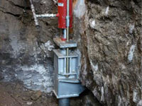 Foundation repair contractors lifting a structure in Schenectady.