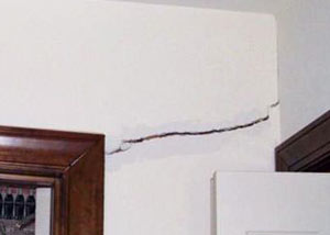 A large drywall crack in an interior wall in Colonie
