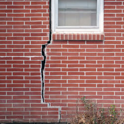 A foundation with a large crack that's wider at the top than on the bottom in Johnstown