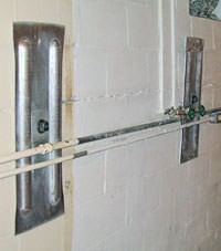 A foundation wall anchor system used to repair a basement wall in Slingerlands
