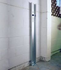 A failing foundation wall repaired with a foundation wall channel anchor system in a Cohoes home.