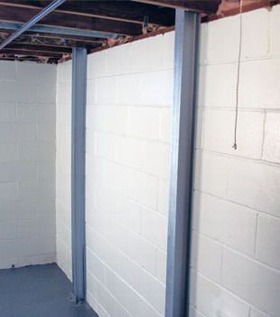 A PowerBrace™ i-beam foundation wall repair system in Albany