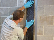 CarbonArmor® Strip applied to wall in Colonie