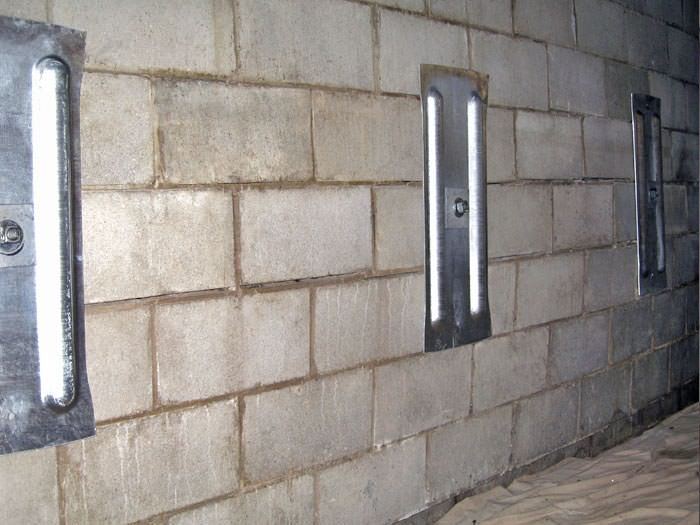 Foundation Repair Contractor Schenectady Albany Troy An Inside View Of Foundation Wall Anchors Installed Along A Bat To Brace And Repair