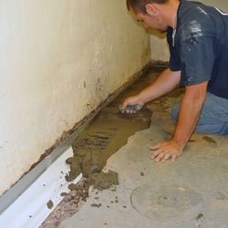 Testing a French drain system in a Amsterdam home.
