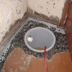 Installing a sump in a sump pump liner in a Troy home