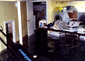 A laundry room flood in Gansevoort, with several feet of water flooded in.