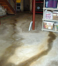 Flooding entering a basement through a floor crack in East Greenbush