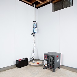 Sump pump system, dehumidifier, and basement wall panels installed during a sump pump installation in Gansevoort