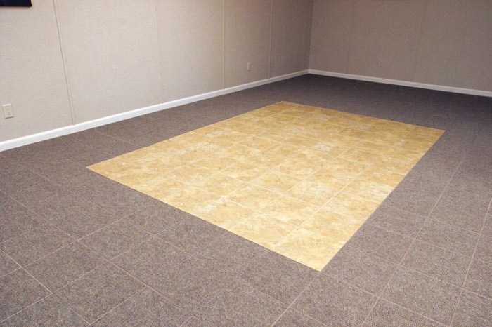 tiled and carpeted basement flooring installed in a Saratoga Springs home